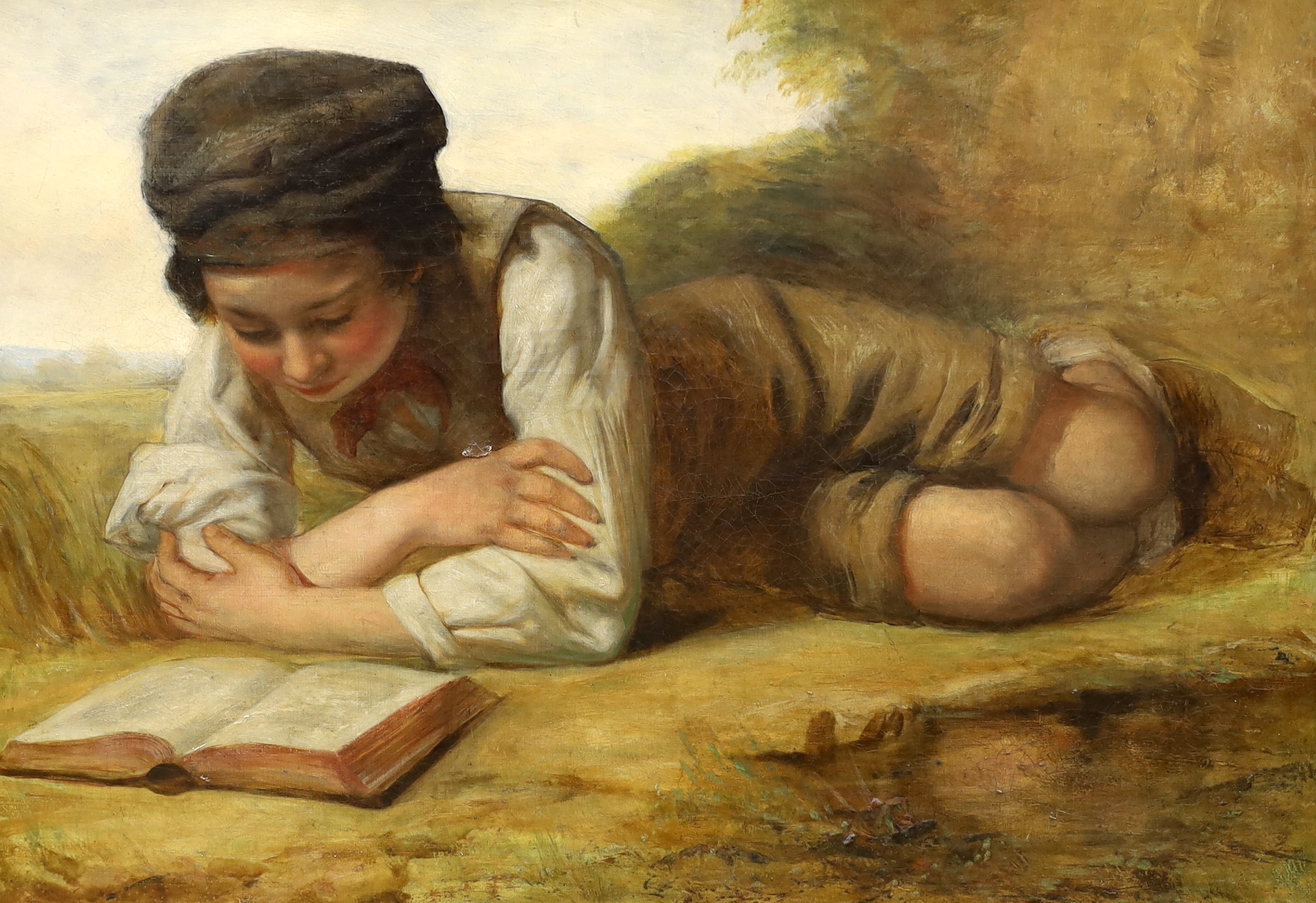 Charlie Compton (1828-1884), oil on canvas, Boy reading a book before a landscape, inscribed verso, 52 x 37cm